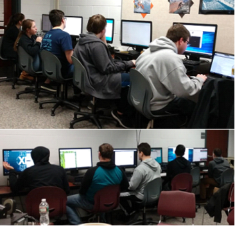 Cyber Patriot students competing on computers